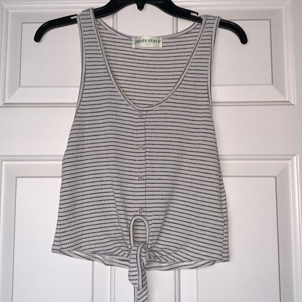 Pants Store brand tank top.
